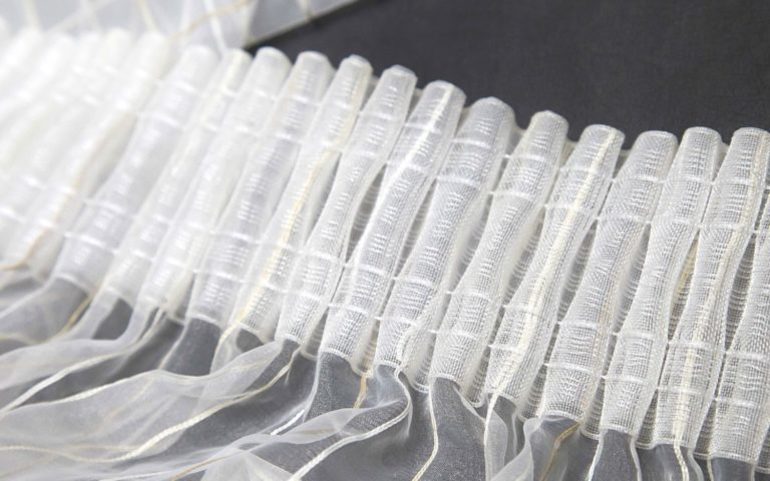 Lint voor het maken van franjes op de gordijnen
